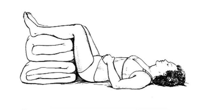 Postura recomendada para atirar na dor lombar na perna e na nádega